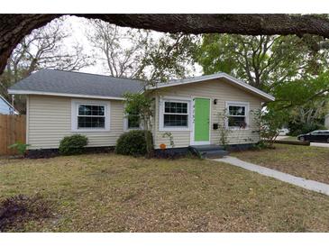Charming one-story home with a well-maintained front yard and inviting green front door at 4162 3Rd N Ave, St Petersburg, FL 33713