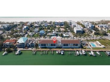 Waterfront condominium with boat slips, beautiful architecture and across the street from a gorgeous beach at 3111 Pass A Grille Way # 213, St Pete Beach, FL 33706