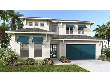 Stunning two-story home featuring a blue garage door, awnings, lush landscaping, and a paver driveway at 3821 109Th Street East, Palmetto, FL 34221