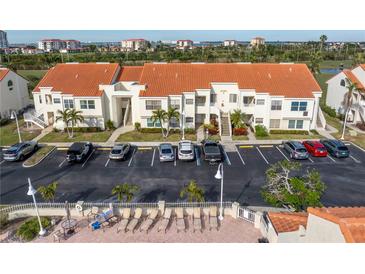 Beautifully landscaped condominium complex with ample parking and a view of the golf course at 6181 Bahia Del Mar Blvd # 112, St Petersburg, FL 33715