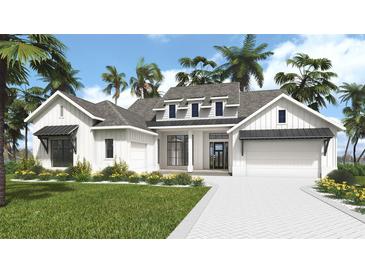 Charming single-Gathering home displaying modern architectural design with a spacious two-car garage and beautifully landscaped front yard at 6614 Summit View Dr, Brooksville, FL 34601