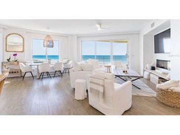 Bright, open living space with stunning ocean views and stylish, modern furnishings at 1200 Gulf Blvd # 902, Clearwater Beach, FL 33767