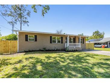 Charming single-story home with a well-maintained front yard and inviting curb appeal at 1817 E Calhoun St, Plant City, FL 33563