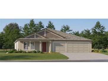 Charming single-story home featuring a two-car garage and a well-manicured lawn at 11861 Blue Diamond Trl, Parrish, FL 34219
