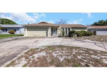 Charming single-story home with a well-maintained lawn and attached two-car garage at 1137 54Th S Ave, St Petersburg, FL 33705