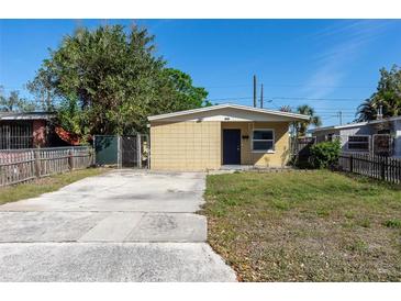 Charming single-story home featuring a concrete driveway and well-maintained yard at 3235 6Th S Ave, St Petersburg, FL 33701
