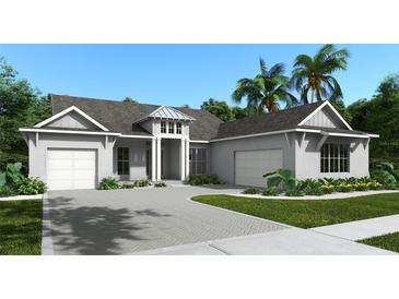 Beautiful new home with landscaped yard and brick paver driveway on a sunny day at 5820 Creek Ridge Rd, Brooksville, FL 34601