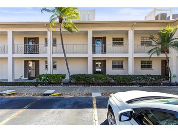 The condo complex features an attractive façade and easy access to parking at 19029 Us Highway 19 N # 2-17, Clearwater, FL 33764