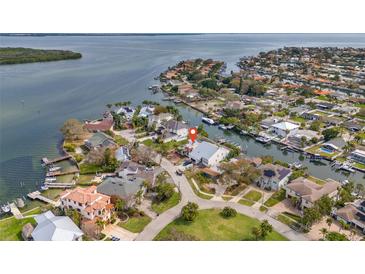 Waterfront home with lush landscaping, private docks, and stunning bay views at 1936 Arrowhead Ne Dr, St Petersburg, FL 33703