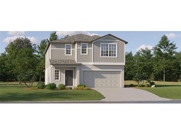 Charming two-story home with landscaped yard, attached garage, and neutral color palette at 8432 Sea Ray Run, Parrish, FL 34219