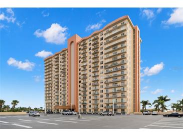 Modern high-rise condo building featuring private balconies, neutral colors and ample parking at 4900 Brittany S Dr # 205, St Petersburg, FL 33715