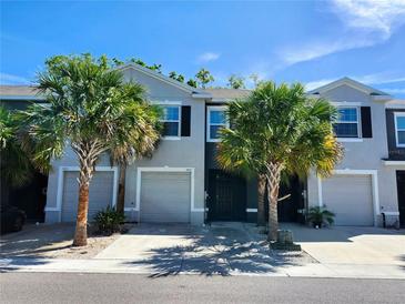 Charming townhome with a private garage, well-kept landscaping, and welcoming curb appeal at 3267 Pleasant Willow Ct, Brandon, FL 33511