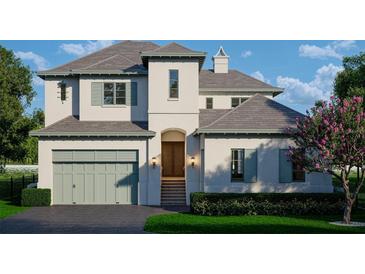 Beautiful two-story home with a charming entryway, gray roof, inviting curb appeal and an attached two-car garage at 6151 Bayou Grande Ne Blvd, St Petersburg, FL 33703