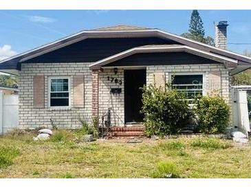 Charming single-story brick home with well-maintained facade and chimney at 1763 Shore Acres Ne Blvd, St Petersburg, FL 33703