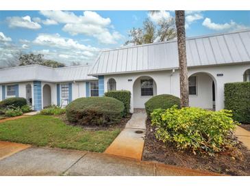 Charming home showcasing a well-manicured lawn and freshly painted exterior in a desirable community at 4235 Richmere Dr # 4235, New Port Richey, FL 34652