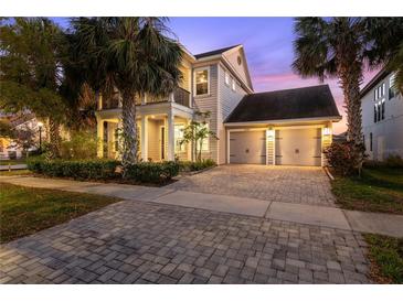 Charming two-story home with a well-maintained yard, two-car garage and beautiful landscaping at 14123 Barrington Stowers Dr, Lithia, FL 33547