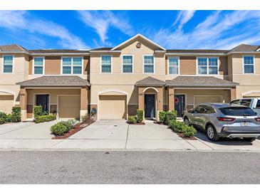 Charming multi-Gathering unit featuring neutral color scheme, attached garages, and well-maintained landscaping at 4081 71St N Ter, Pinellas Park, FL 33781