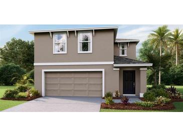 Two-story home showcasing a neutral color palette, a two-car garage, and professionally landscaped grounds at 4436 Sand Dollar Way, Zephyrhills, FL 33541
