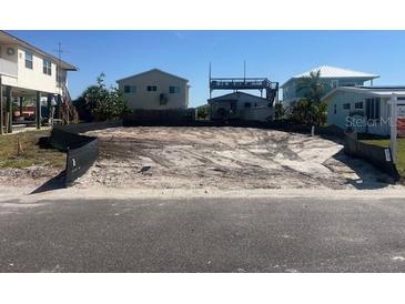 Vacant lot ready for building with utilities available and desirable neighborhood close to beach at 842 180Th E Ave, Redington Shores, FL 33708