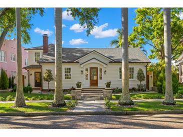 Charming home with landscaped yard, inviting entrance, and a well-maintained exterior at 346 16Th Ne Ave, St Petersburg, FL 33704