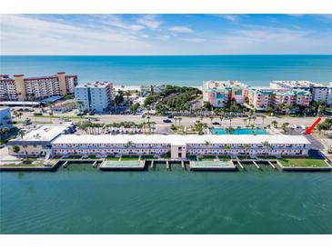 Beautiful waterfront building with a pool and beach views at 18399 Gulf Blvd # 389, Indian Shores, FL 33785