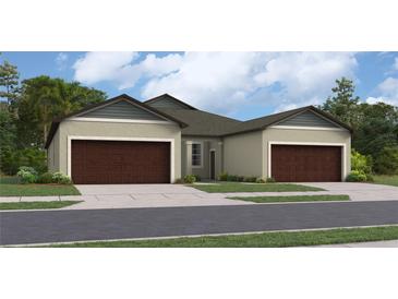 Charming home with a two-car garage and lush landscaping in a Gathering-friendly neighborhood at 12553 Lily Quartz Loop, Parrish, FL 34219