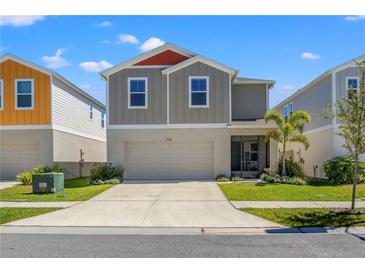 Charming two-story home featuring a spacious two car garage and welcoming curb appeal at 7580 Freesia Trce, Wesley Chapel, FL 33545