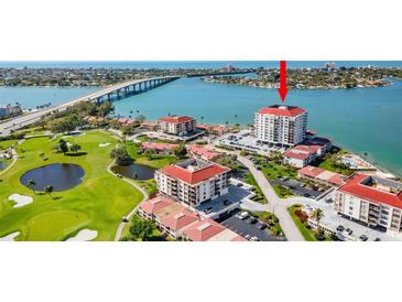 Panoramic aerial view showcases the condo's golf course frontage, tennis courts, and amazing views of the bay at 6265 Sun Blvd # 1201, St Petersburg, FL 33715