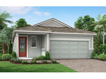 Charming single story home with a two car garage, light gray siding, and a red front door at 17800 Solstice Ave, Venice, FL 34293