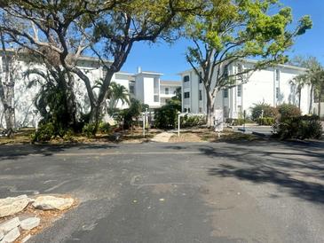 Well-maintained condominium complex with mature trees and ample parking at 6304 Pointe West Blvd # A206, Bradenton, FL 34209