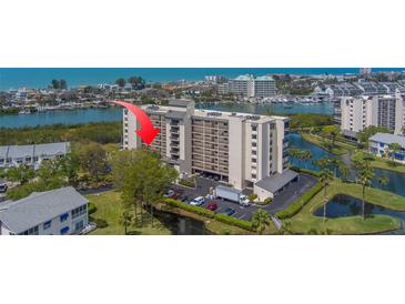 Aerial shot of waterfront condo community and boat docks at 11590 Shipwatch Dr # 342, Largo, FL 33774