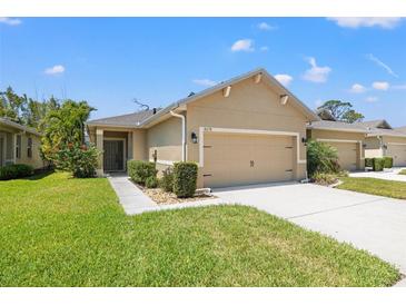 Charming single-story home featuring a two-car garage and well-maintained landscaping in a quiet neighborhood at 8078 Pine Crest St, Seminole, FL 33777