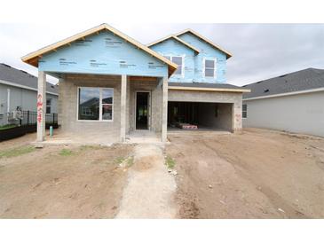 New construction home showing concrete block and window placement, in early stages at 11884 Richmond Trl, Parrish, FL 34219