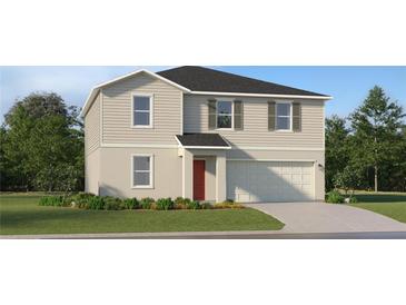 Inviting two-story home with a neutral color scheme, attached garage, and a well-manicured front yard at 11959 Brae Way, Dade City, FL 33525