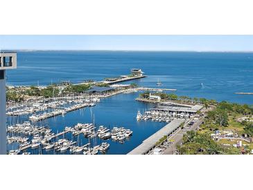 Breathtaking aerial view of a marina with yachts and city waterfront at 175 1St S St # 3008, St Petersburg, FL 33701