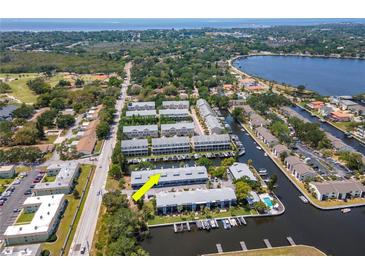 Waterfront condos feature boat docks, serene views, and easy access to the open bay at 200 Meres Blvd # 7, Tarpon Springs, FL 34689