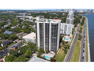 Stunning aerial view of the high rise condo with pool and waterfront access at 2413 Bayshore Blvd # 605, Tampa, FL 33629