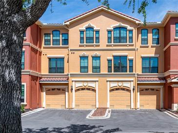 Beautiful townhome with a two-car garage, and neutral paint gives a feeling of being home at 2709 Via Cipriani # 522B, Clearwater, FL 33764
