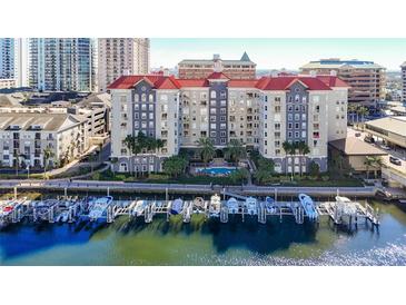 Beautiful condominium building features a marina, waterfront access, and a community pool at 700 S Harbour Island Blvd # 143, Tampa, FL 33602