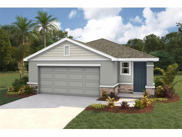 Charming single story home featuring a two car garage, stone accents, neutral paint, and tropical landscaping at 10567 Dusty Boot Rd, Land O Lakes, FL 34638