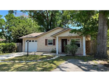 Charming single-story brick home with a well-manicured lawn and inviting curb appeal at 4824 16Th St, Zephyrhills, FL 33542