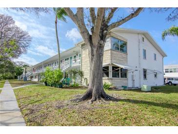 Charming two-story condo with landscaped yard at 5850 21St N St # 12, St Petersburg, FL 33714