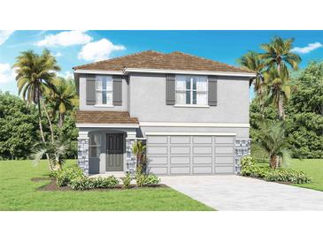 Two-story home with a gray exterior, gray shutters, and a two-car garage at 5231 Salt Marsh Rd, Wimauma, FL 33598