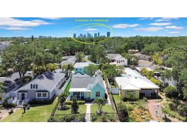 Charming neighborhood homes with lush landscaping and stunning downtown St. Petersburg skyline views at 136 30Th N Ave, St Petersburg, FL 33704