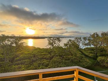 Enjoy panoramic water views and breathtaking sunsets from the comfort of this waterfront property at 1720 Lighthouse S Ter # 8, South Pasadena, FL 33707