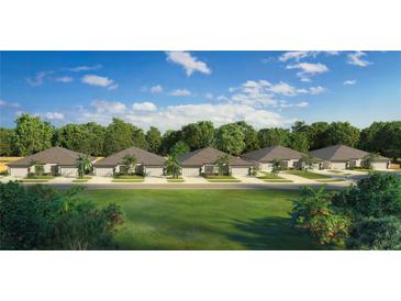 New construction single story homes feature paver driveways, sidewalks, and manicured lawns at 2024 Sidney St, Clearwater, FL 33763