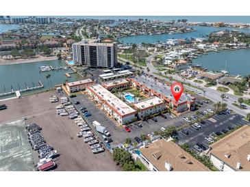 Waterfront condo complex with boat docks, pool, and beautiful bay views for a relaxing Florida lifestyle at 10365 Paradise Blvd # 4, Treasure Island, FL 33706