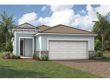 Charming single-Gathering home showcasing a well-maintained lawn and a two-car garage at 11290 Boundless Ter, Venice, FL 34293