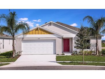 Charming single-Gathering home with a red front door, white garage, and well-maintained landscaping at 14781 Summer Branch Dr, Lithia, FL 33547