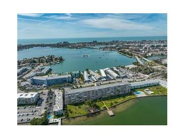 Aerial view of waterfront condo building near downtown and beaches at 1847 Shore S Dr # 507, South Pasadena, FL 33707